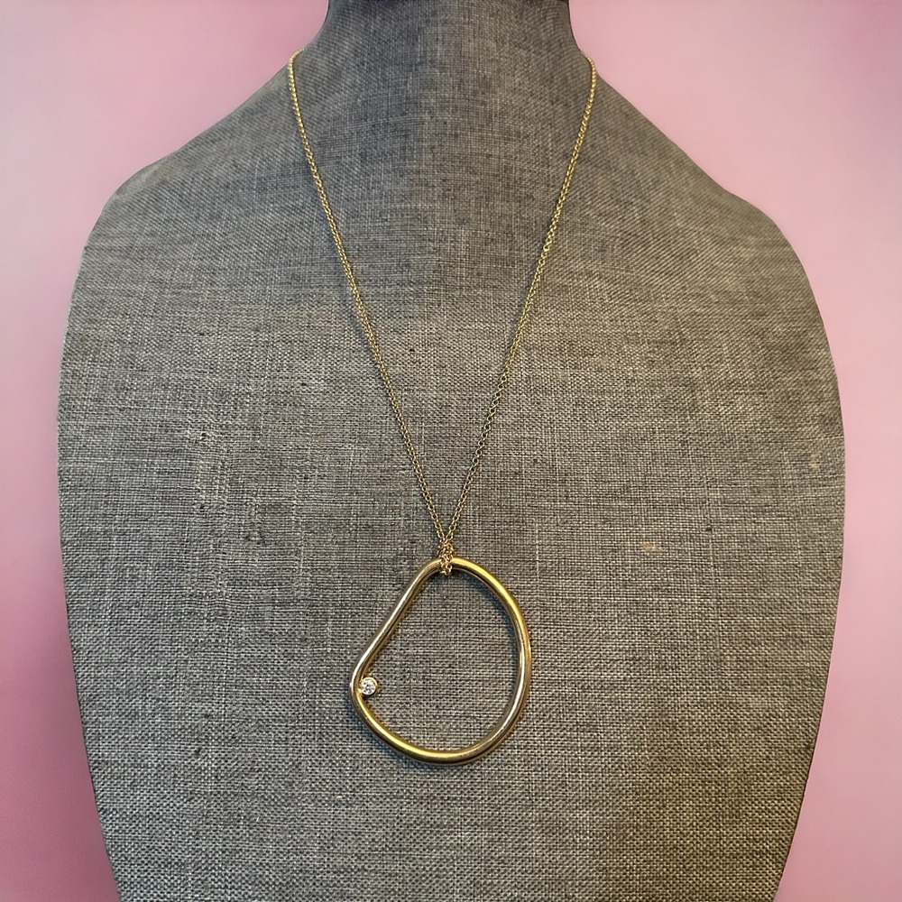 Cole Haan gold tone lopsided hoop pendant necklace